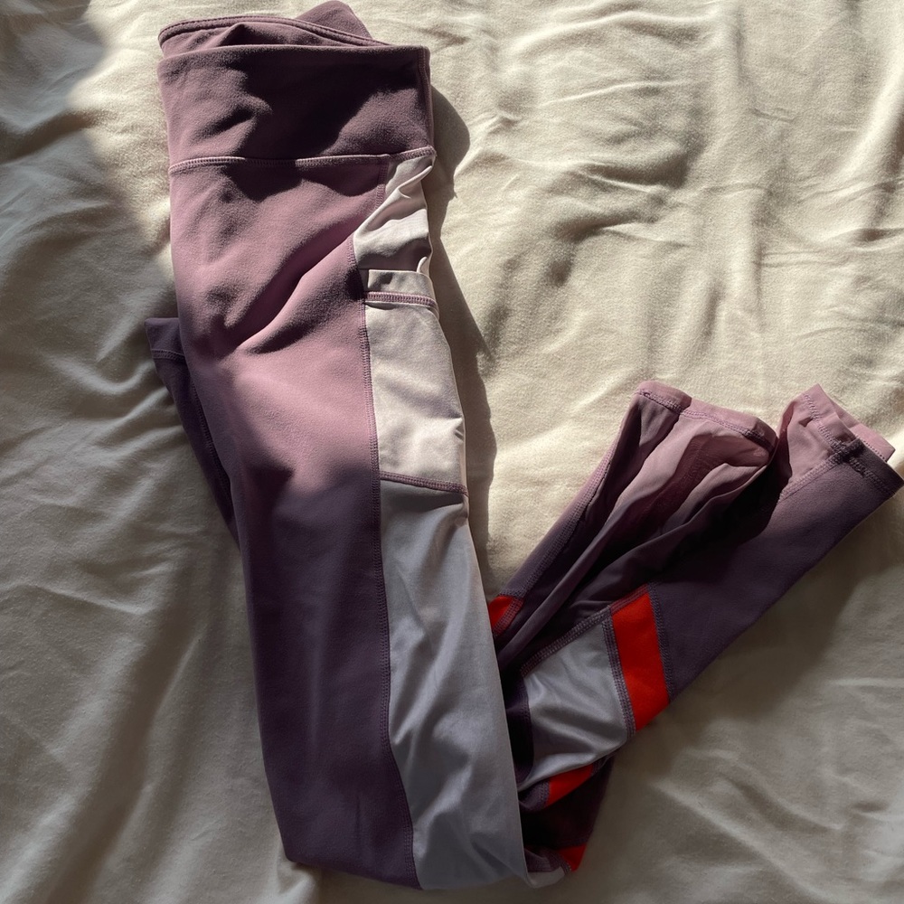 Fabletics leggings with pockets and mesh inserts